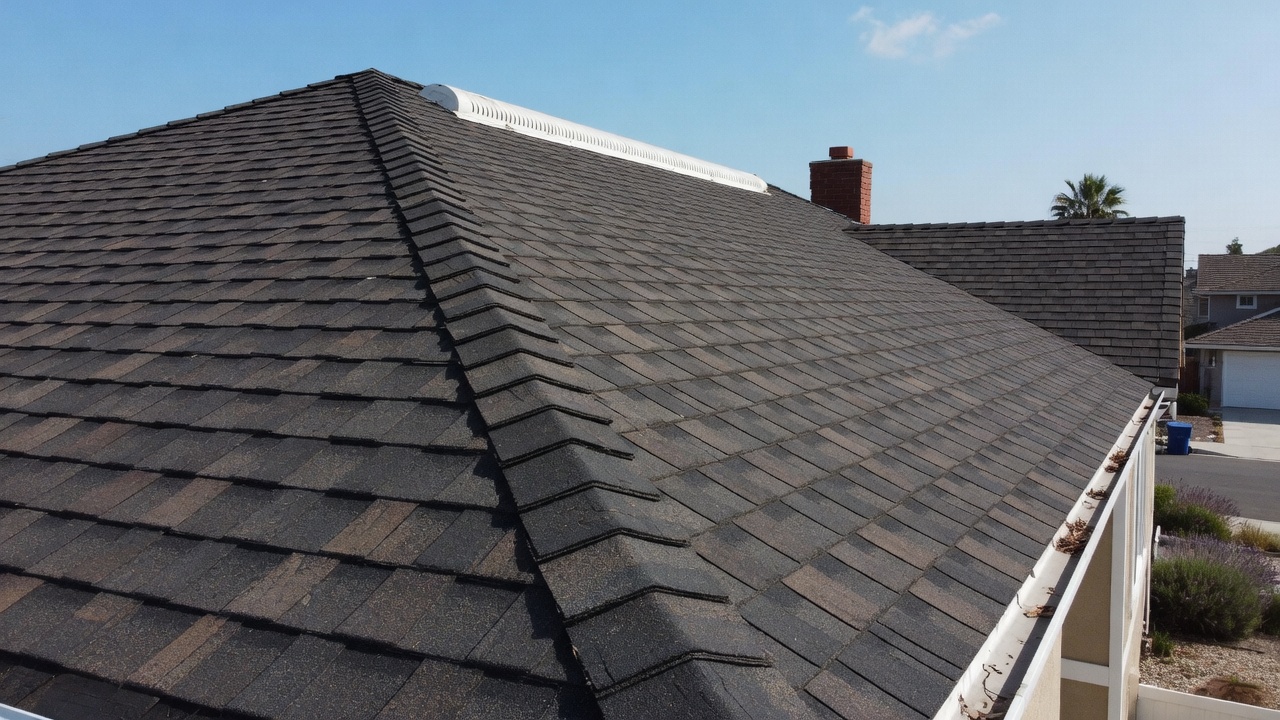 Completed residential roof replacement with architectural asphalt shingles in Southern California